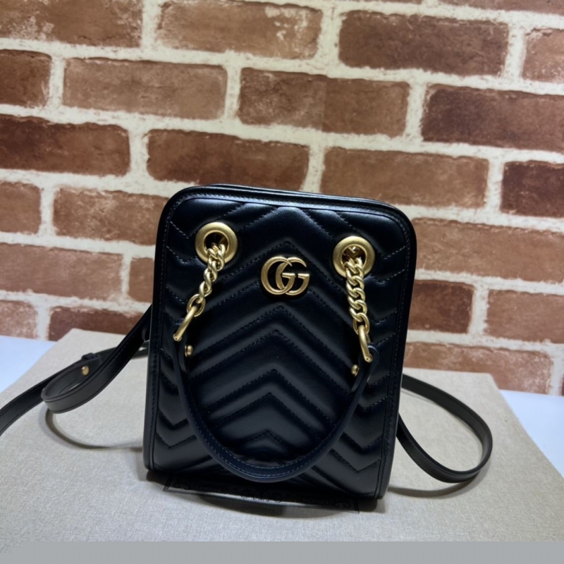 G*u*i top handle bags